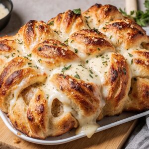 Zupfbrot mit Knoblauch und Käse für unvergessliche Snackmomente 3 Zupfbrot mit Knoblauch und Käse für unvergessliche Snackmomente